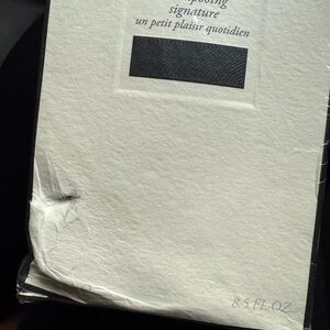 Oribe Signature Shampoo in Black and White